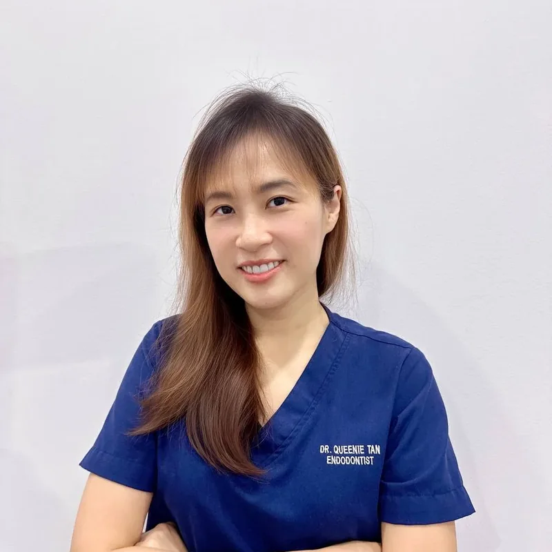 Portrait of Dr. Queenie Tan Guey Zhen, endodontist at Lau & Su Partners Dental Bukit Jalil, specialising in microscope root canal treatment
